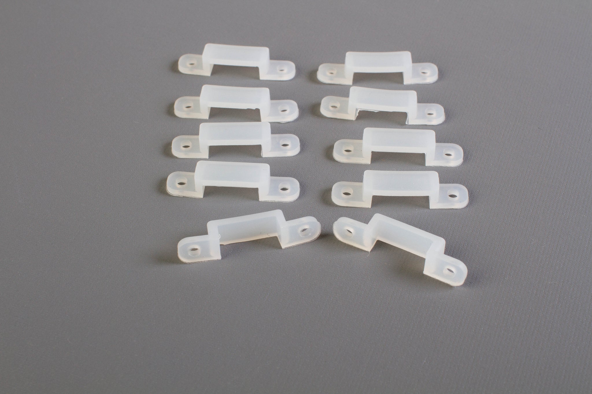 VIPMOON 100pcs Mounting Brackets Clips for 10mm Wide IP65 Waterproof 5050  LED Strip Light, Screws Included